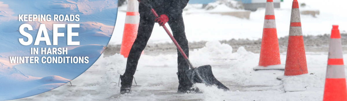 Traffic cones and traffic control equipment keeping roads safe in harsh winter conditions