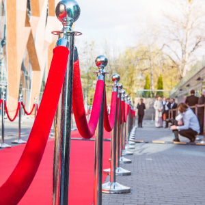 Velvet rope and red carpet at event entrance